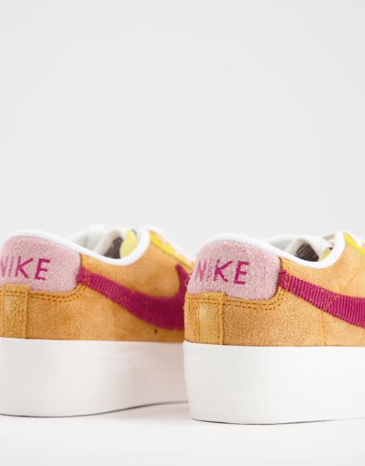 Nike Blazer Sneakers basse con plateau bianche, argento e nere - Main Image