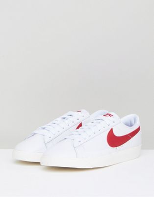 white and red nike blazers
