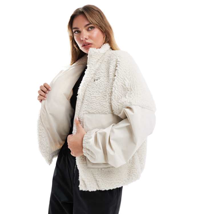 Nike borg jacket in beige ASOS