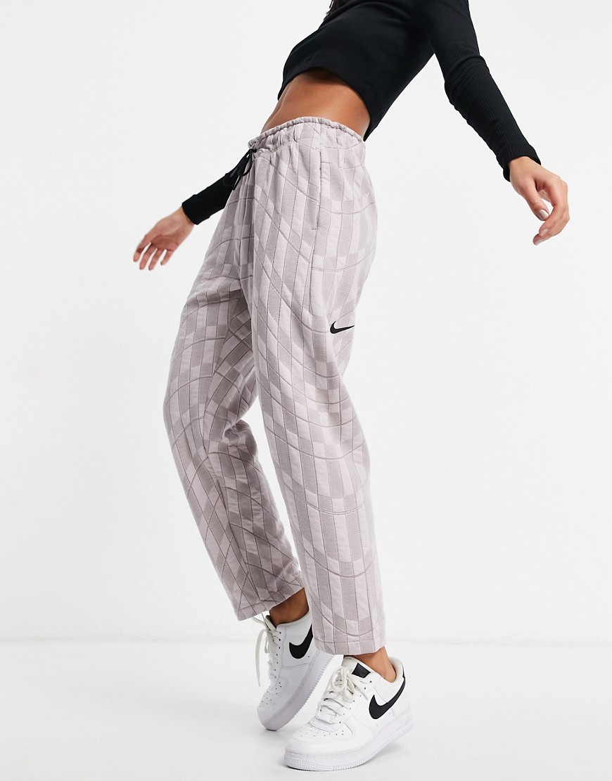 Nike bottoms in light pink with drawstring waist jogger
