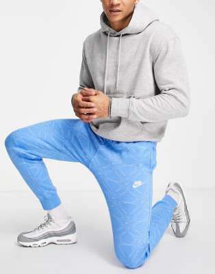 blue nike hoodie and sweatpants