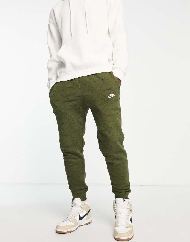 Nike Branded AOP pack cuffed fleece sweatpants in khaki - KHAKI