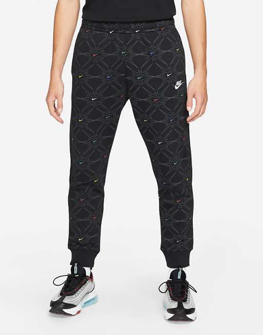 Nike Branded AOP Pack logo cuffed sweatpants in black | ASOS