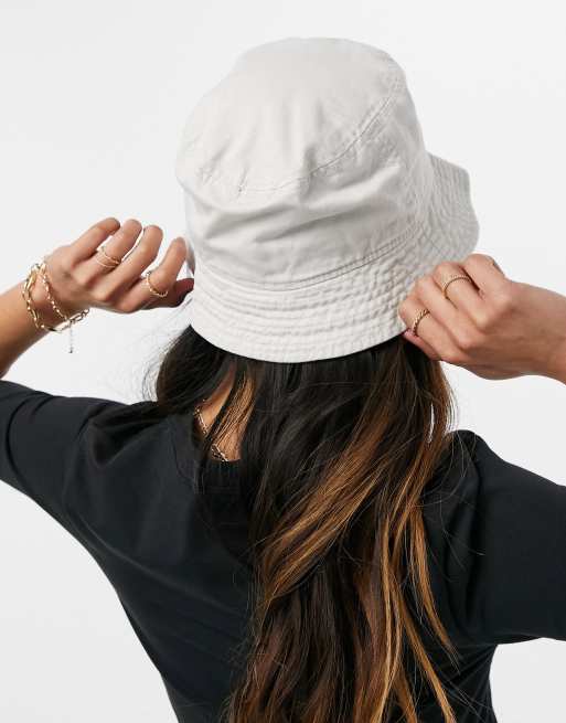 Nike bucket hat in off white with logo ASOS