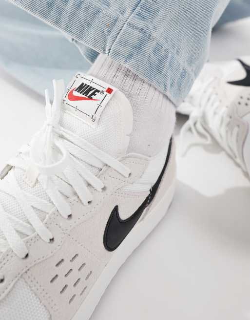 Nike C1TY sneakers in white and black