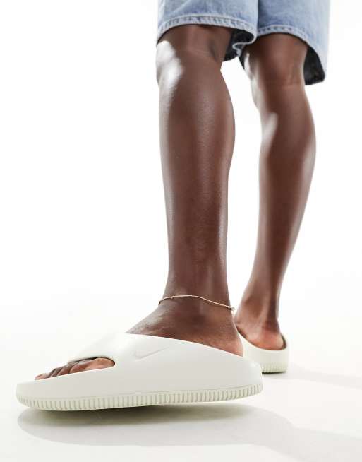 Nike Calm flip flops in off white | ASOS