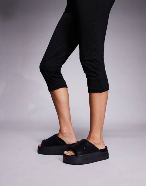 Nike Calm platform cozy slides in black