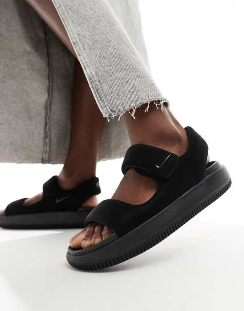 Nike Calm sandals in black - view 1