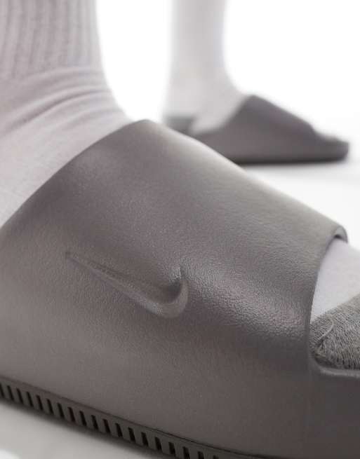 Nike grey sliders hot sale