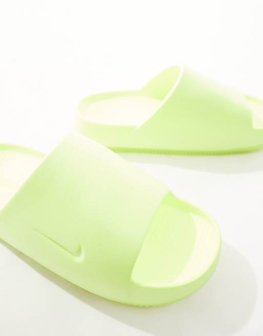 Nike Calm Sliders in bright green