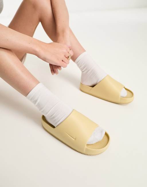 Nike Calm sliders in sesame brown