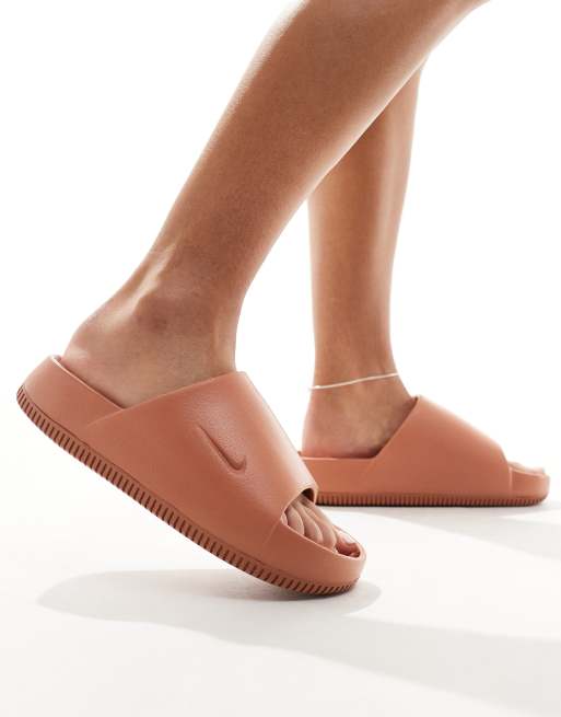 Nike Calm slides in brown