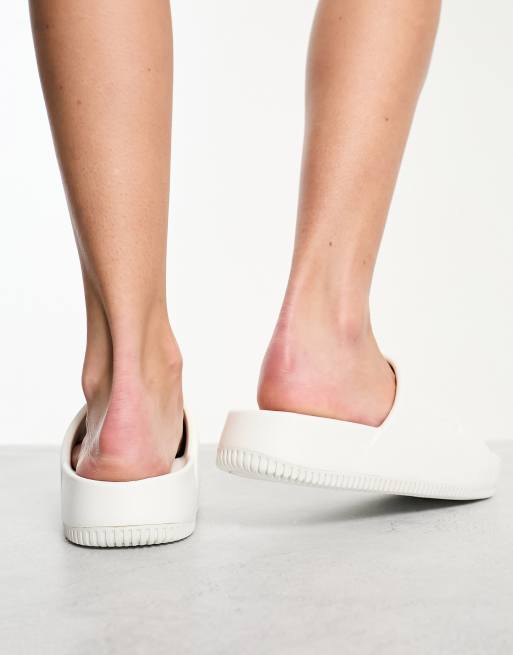Nike Calm Slides in off white 