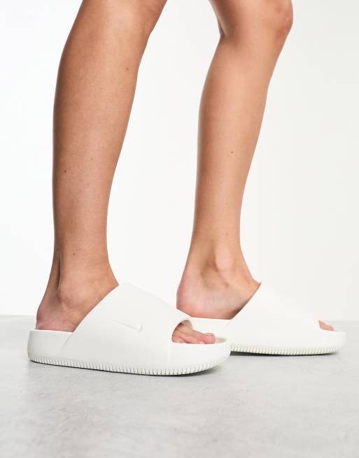 Nike Calm Slides in off white 