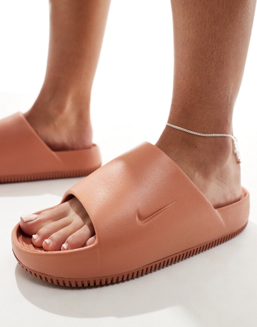 Shop Nike Calm Slides In Brown