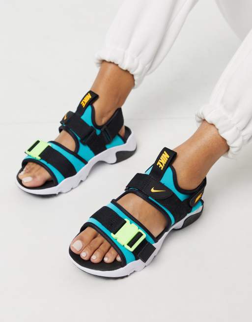 Nike Canyon sandals in turquoise blue