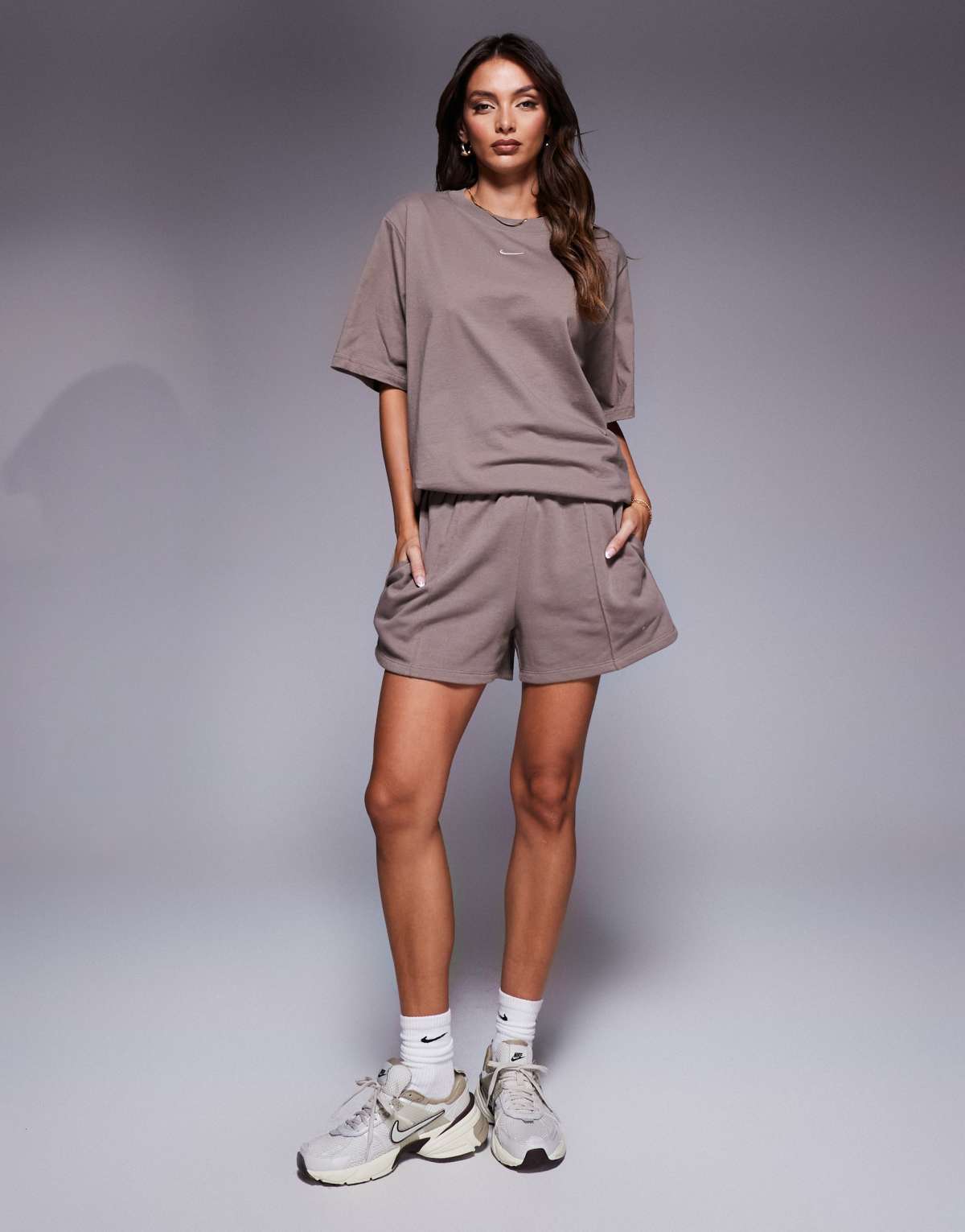 Nike Chill high waisted Phoenix Fleece shorts in brown