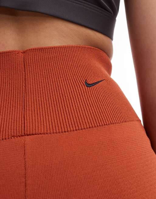 Nike orange pants online