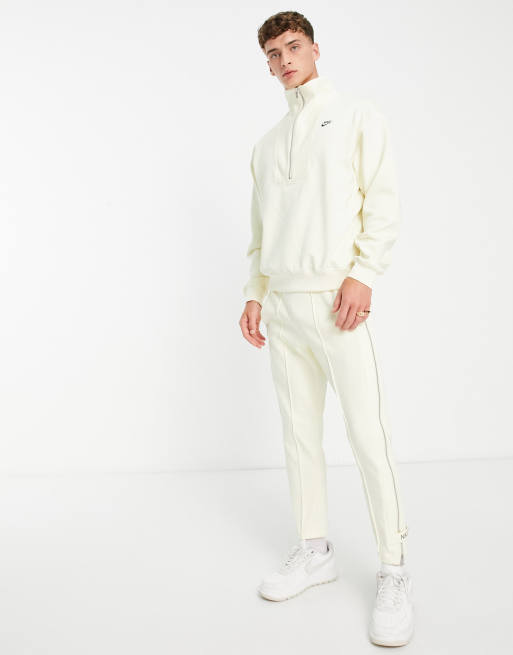 Nike circa pack half zip sweat in coconut milk | ASOS