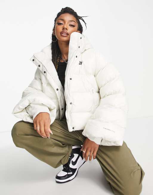 Nike City Tech padded jacket in light bone ASOS