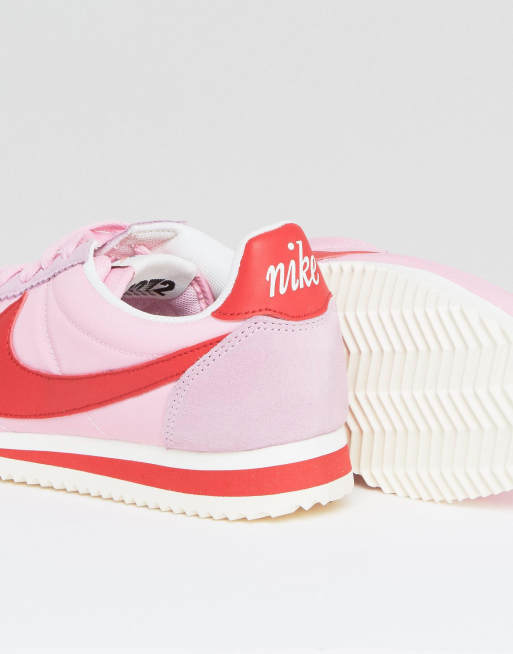 Nike classic cortez pink and sales white trainers