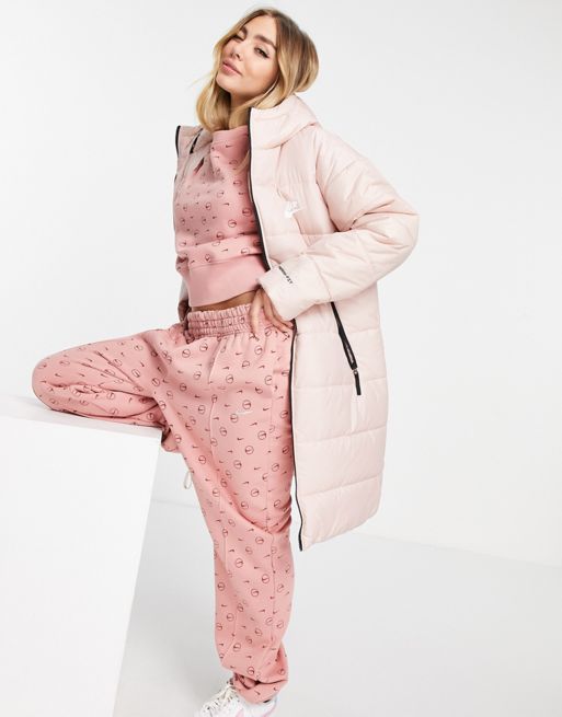 Nike classic longline padded jacket with hood in pink oxford