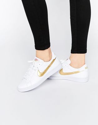 nikes with gold swoosh