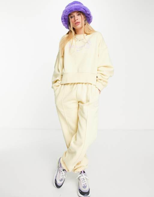 Nike - Clear the Mind - Joggingbroek met kleine swoosh in citroengeel