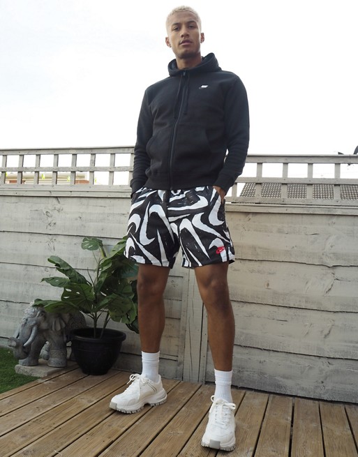 Nike Club all over logo print woven shorts in black