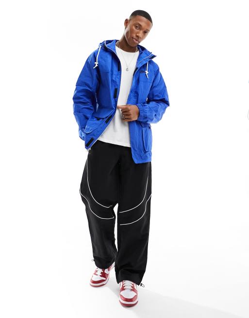 Bright blue windbreaker hotsell