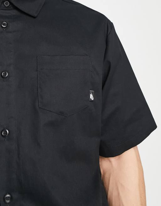 Nike Club Men's Button-Down Short-Sleeve Top.