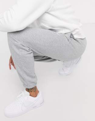 nike club casual fit cuffed joggers in grey