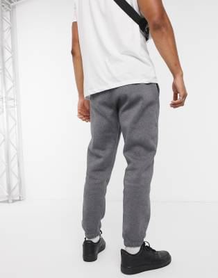 nike club casual fit cuffed joggers in grey