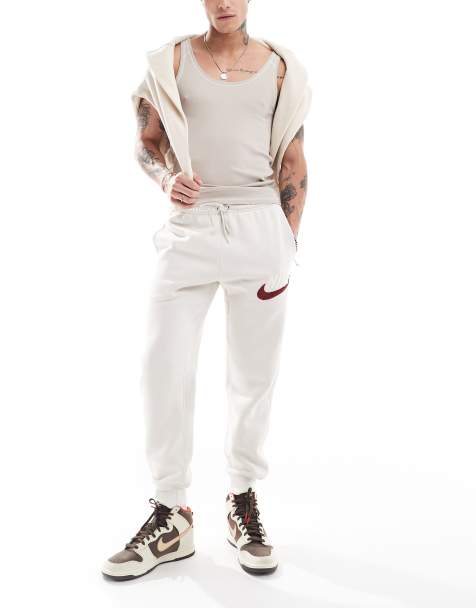 Asos mens nike joggers sales