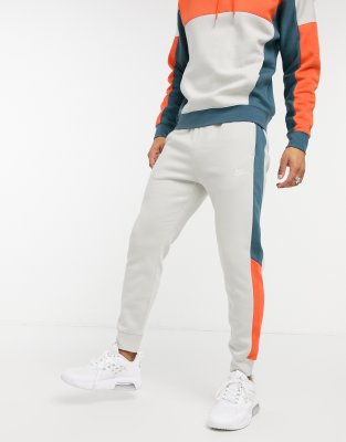 nike club cuffed joggers in stone