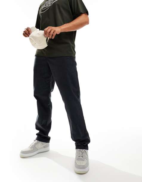 Nike Club corduroy chino trousers in black - view 1