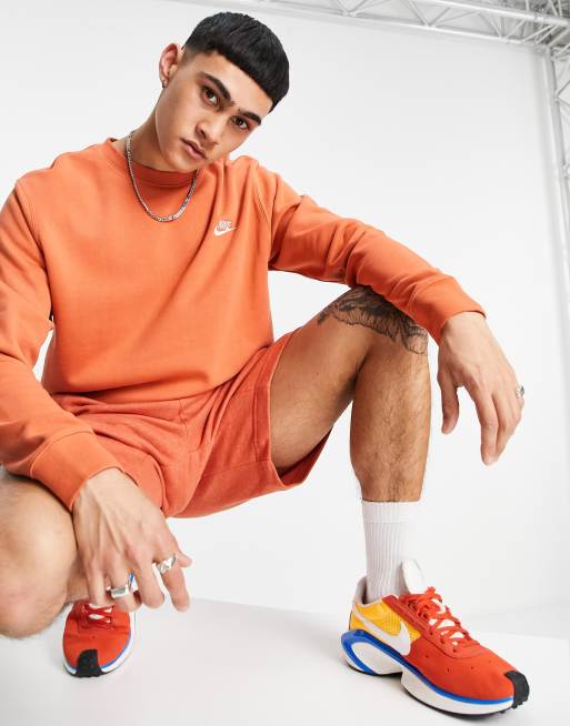 Nike club crew neck sweat in dusty discount orange