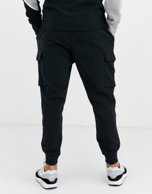 nike club cuffed woven cargo joggers in black