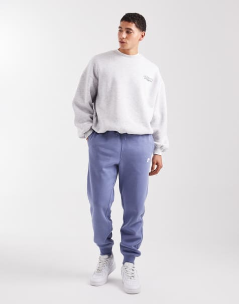 Nike Club cuffed fleece joggers in blue - view 1