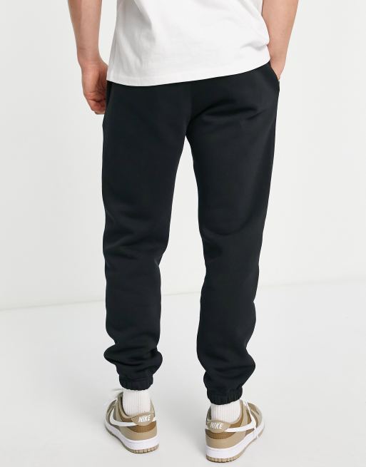 Nike Club cuffed sweatpants in charcoal heather, ASOS