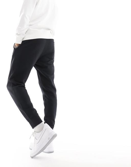 Nike Club cuffed slim fit joggers in black