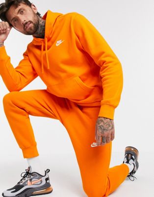 orange nike jumpsuit mens