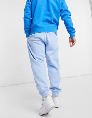 nike club cuffed sweatpants in pale blue