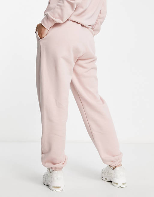 Nike Club essential slim mid-rise jogger in pink