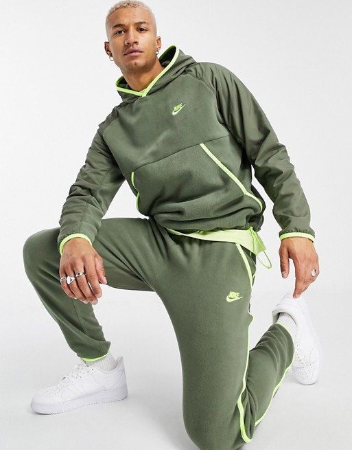 Nike Club Essentials panelled cuffed joggers in khaki | ASOS