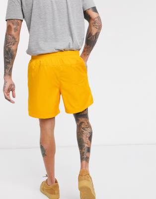 nike essentials shorts in yellow