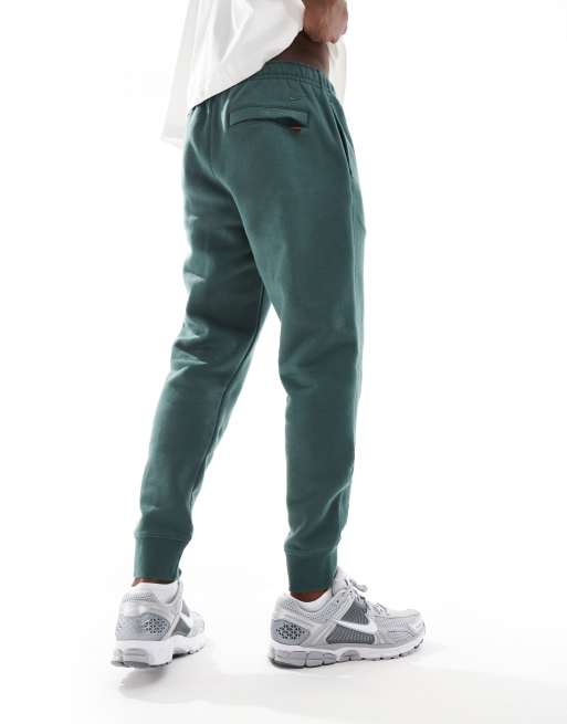 Dark green nike joggers hotsell