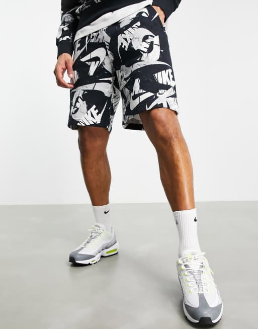 Nike all over store print shorts