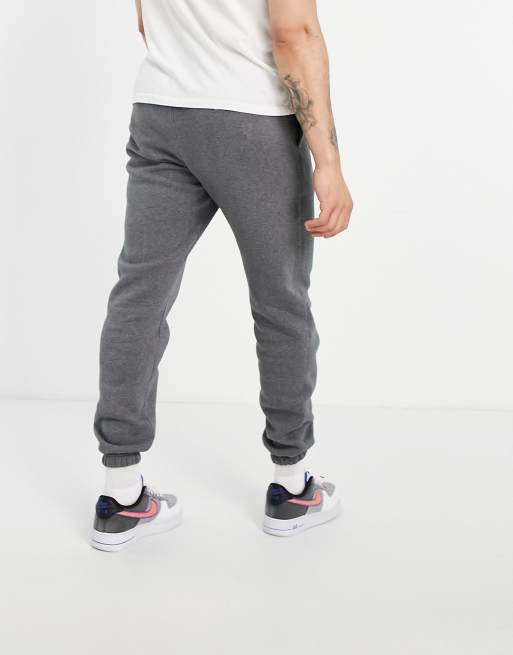 Nike Club Fleece casual fit cuffed sweatpants in black - BLACK