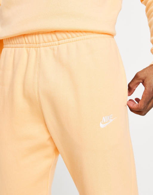 Nike sportswear club discount fleece joggers orange